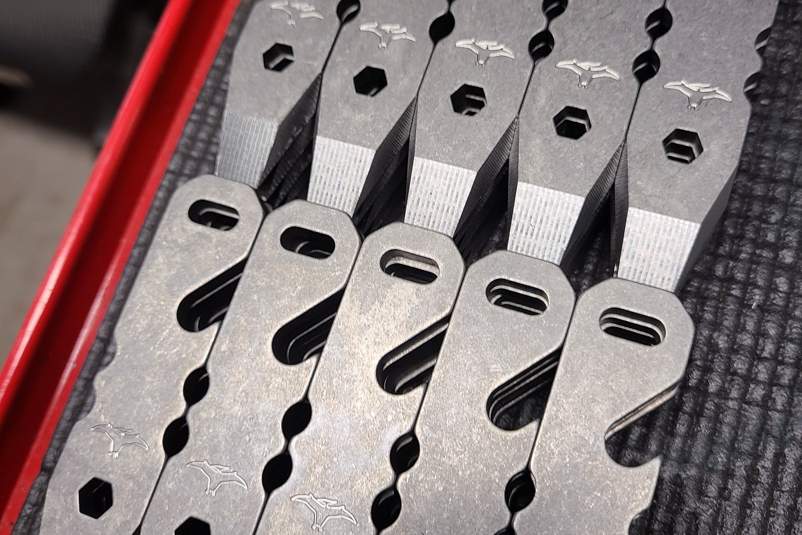Tray of freshly machined titanium tools