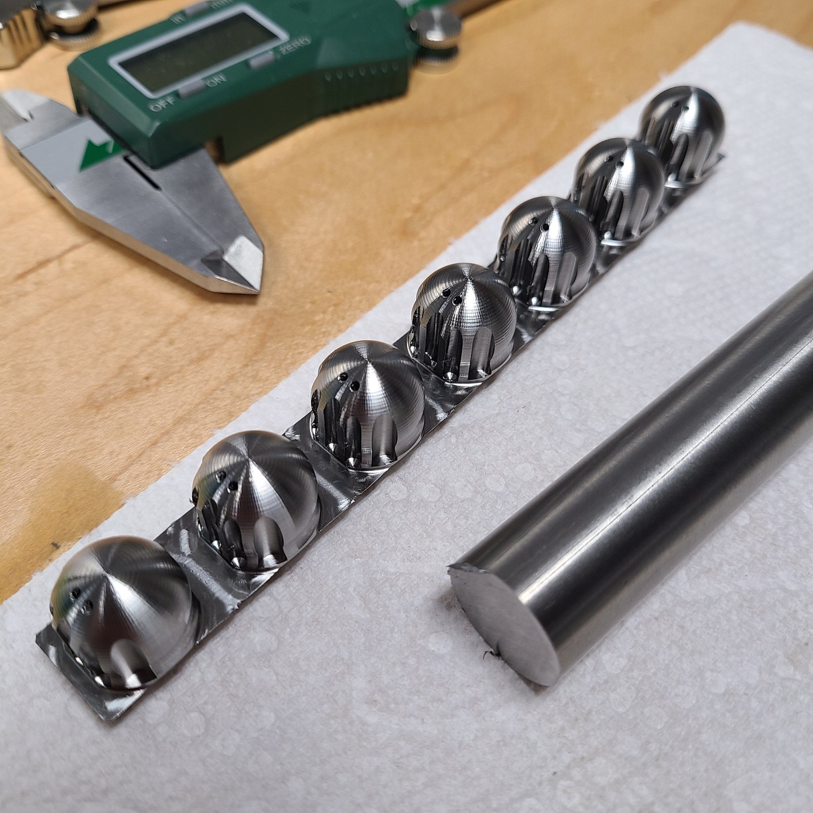 Complex surfacing of parts from round stock
