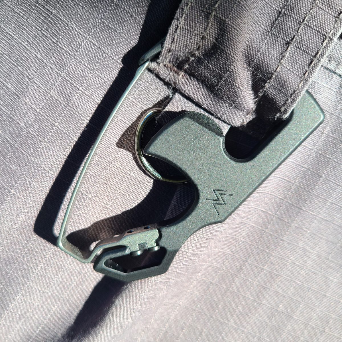 C33 carabiner, stonewash, on ripstop